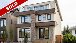 Overlook the ravine views from your third storey rooftop patio